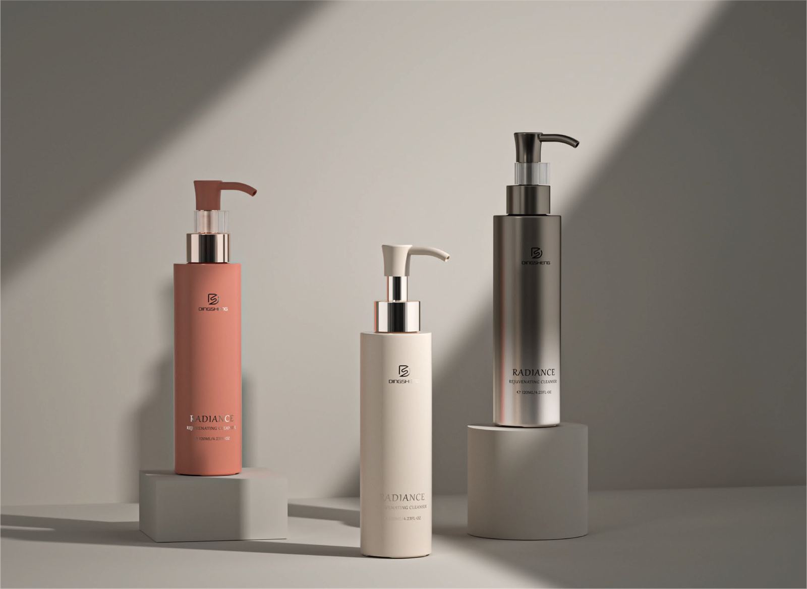 Radiance cleanser pumps in coral, ivory, and silver